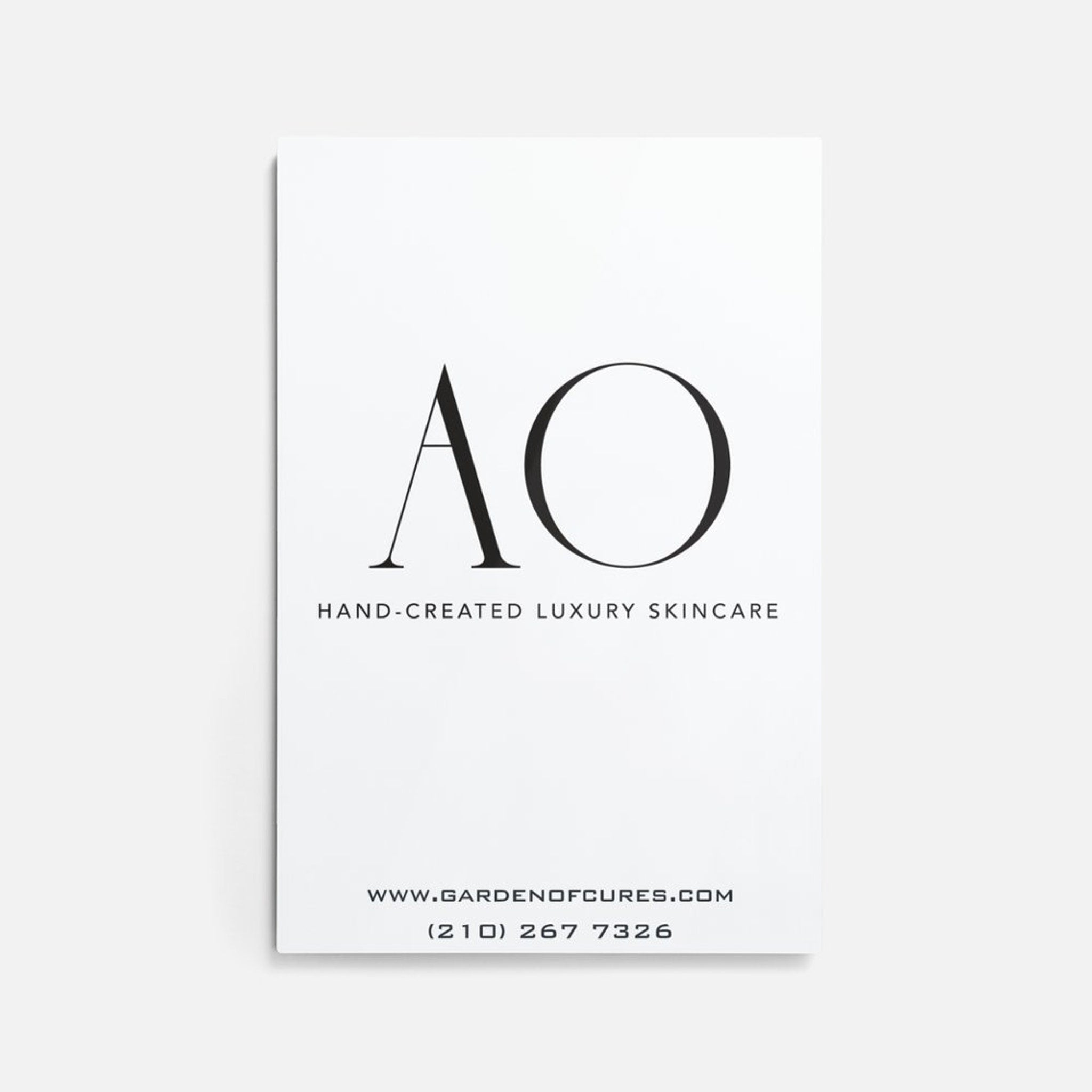 Business card with white background, black text, and AO logo for Garden of Cures