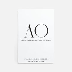 Business card with white background, black text, and AO logo for Garden of Cures