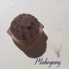 Rich matte mahogany loose mineral eye shadow in dark brown vegan powder form with velvety texture