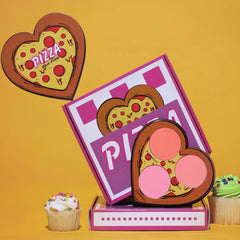 Pizza-shaped blush palette with six heart-shaped eyeshadows in warm pink and bronze shades, cruelty-free packaging