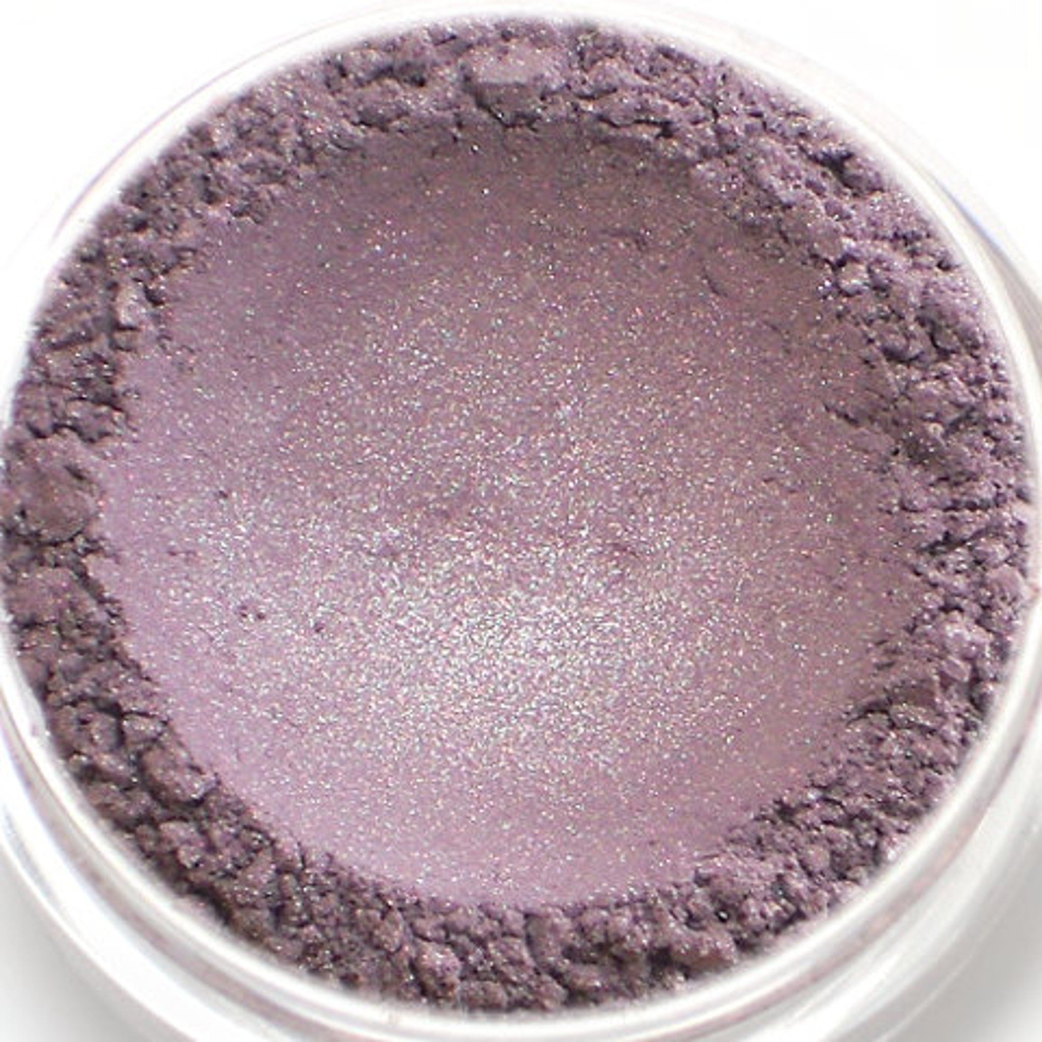Side view of vegan purple shimmer eyeshadow palette showing elegant gradient and satin finish