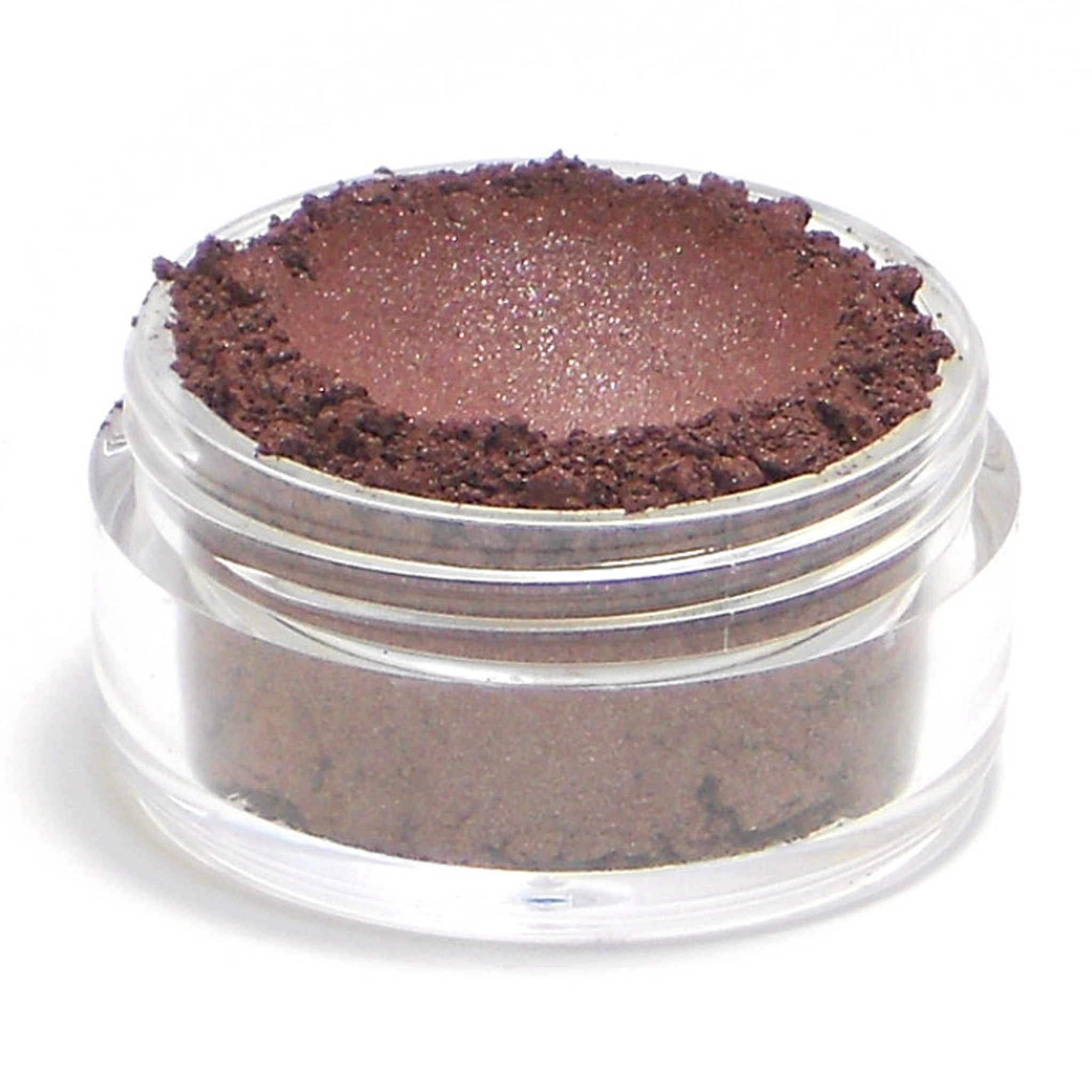 Close-up of burgundy red shimmer eyeshadow being applied to eyelid with brush