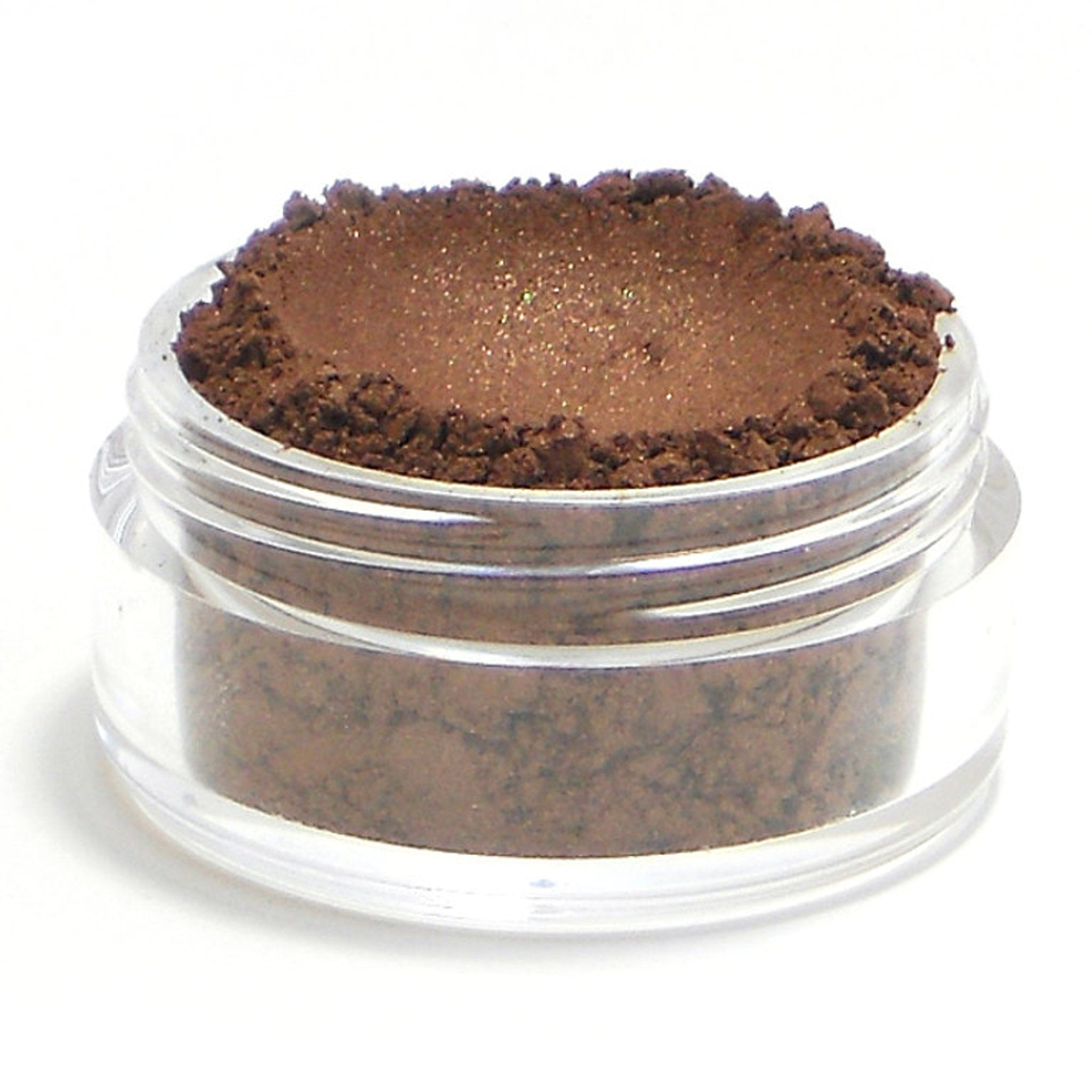 Side view of Legend Vegan Mineral Eyeshadow in bronze shimmer showing pressed powder texture and compact size