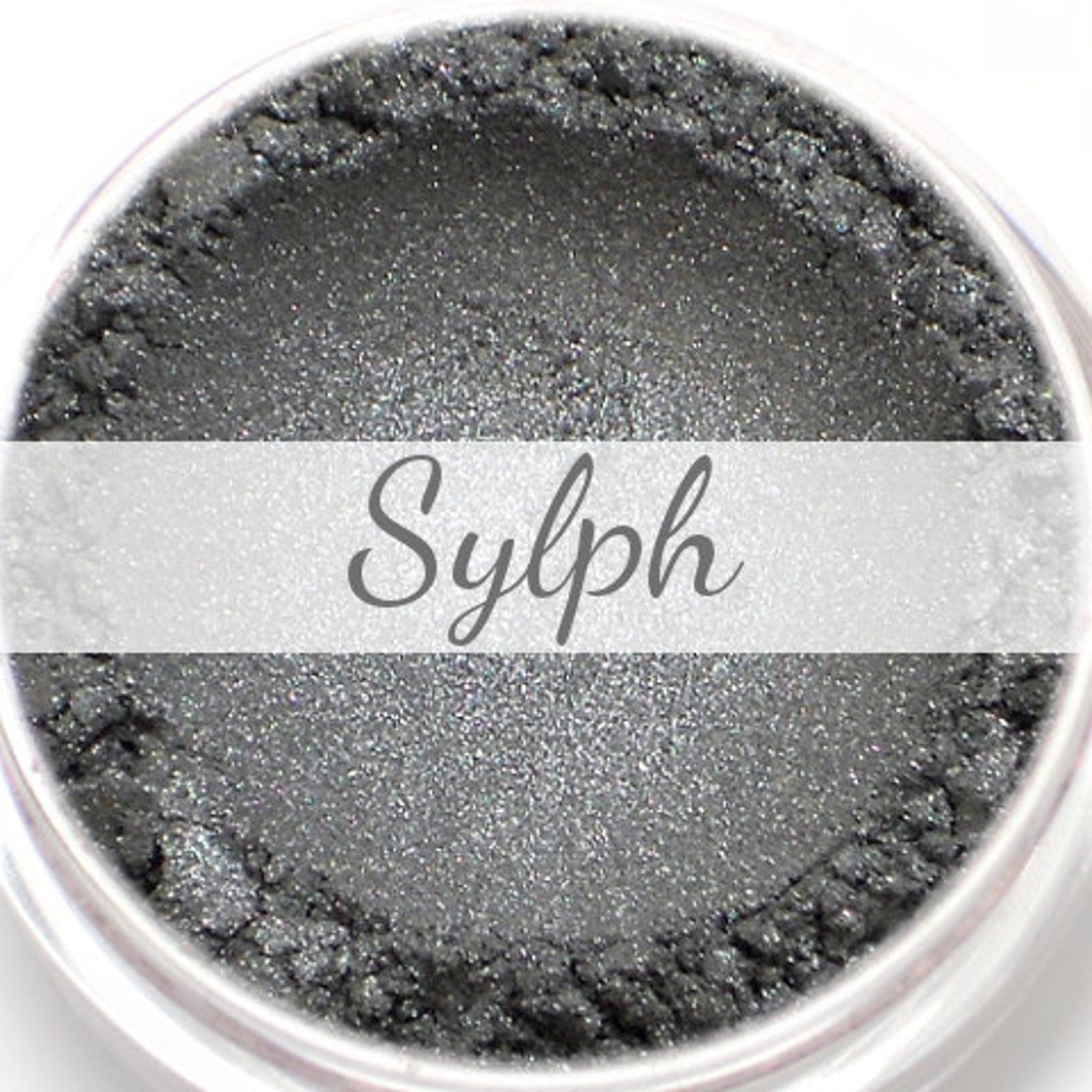 Vegan eyeshadow, silver metallic powder, with "Sylph" text overlay