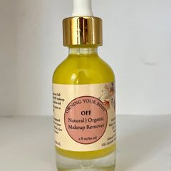 Makeup remover bottle with yellow liquid, gold cap, and label with "OFF" text.