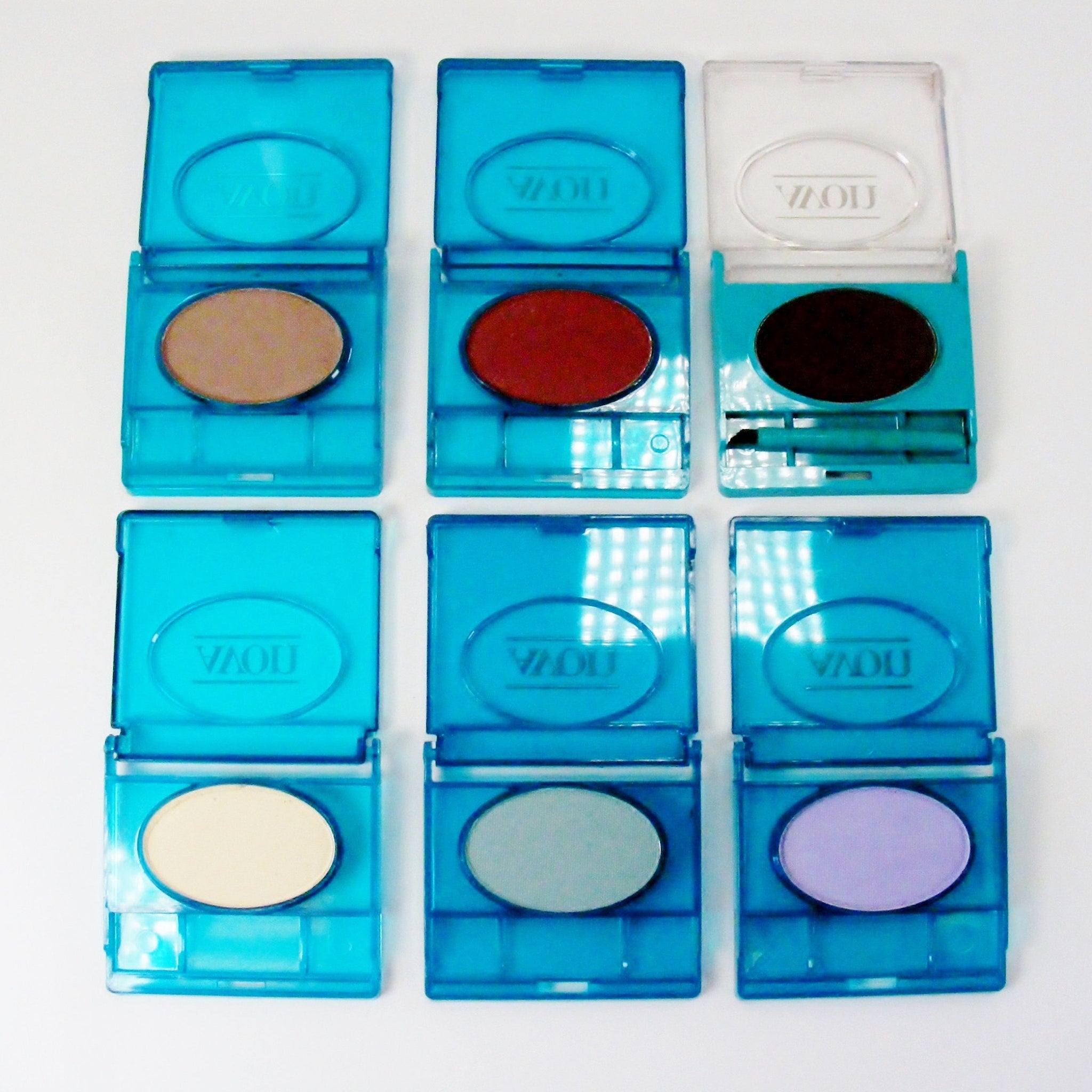 Detailed close-up of Avon 1980s Making Eyes Creamy Powder Shadow - 12 Oz Choice of Shades
