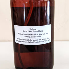 Spray bottle with brown glass, white label, and Florfauna text