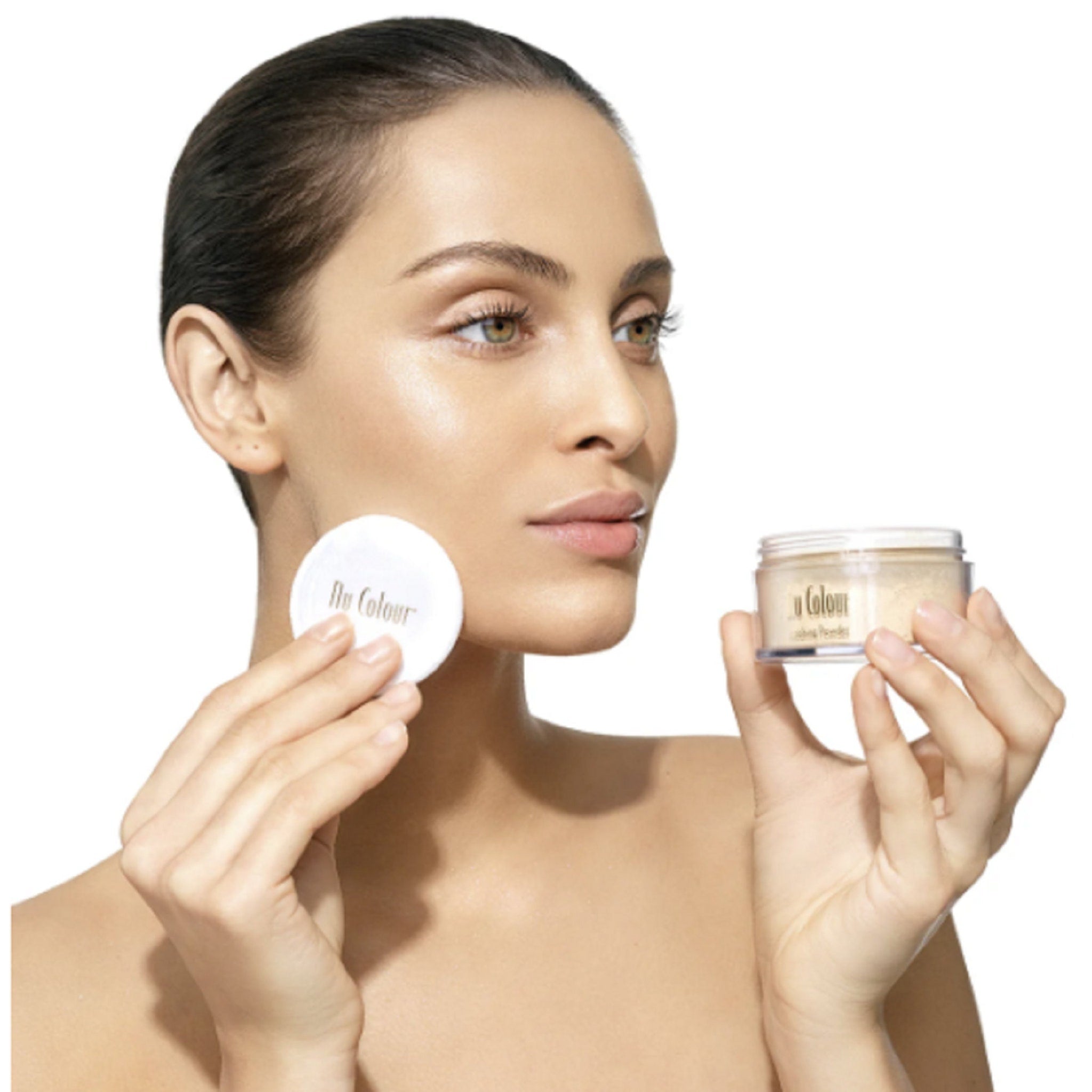 Setting powder with clear jar, beige powder, and white powder puff, Nu Colour brand