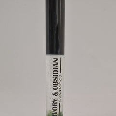 Lip gloss tube with black cap, clear body, and Ivory & Obsidian Cosmetics text