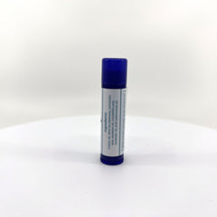 Lip balm tube with blue cap and white label, ingredients list visible, for external use