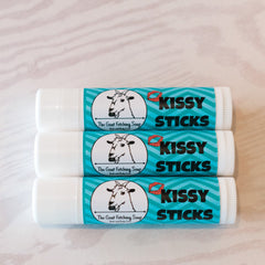 Kissy sticks with white tubes, teal chevron pattern, and The Goat Fetching Soap branding