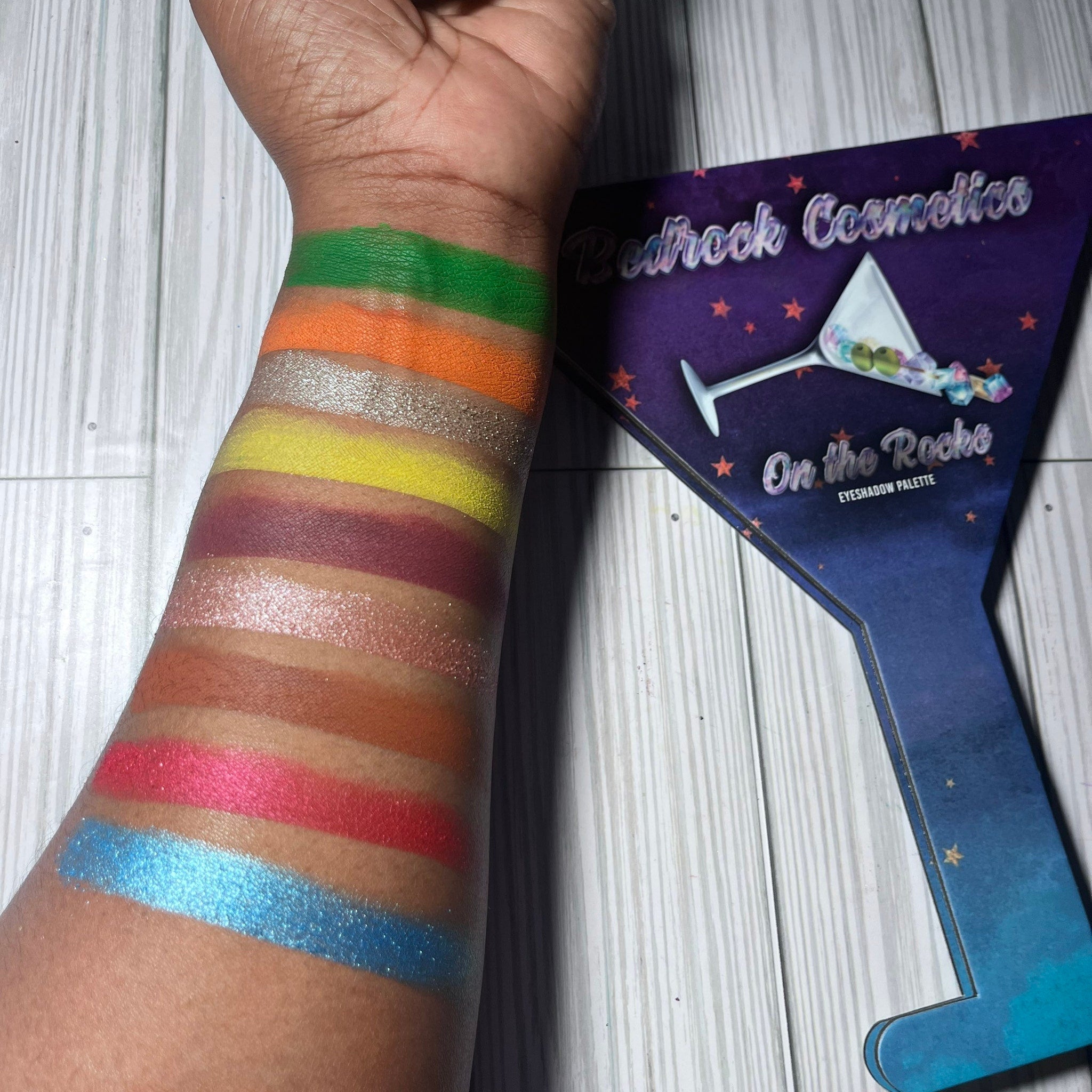 Close-up of On the Rocks Eyeshadow Palette showing rich mineral shades in deep plum and shimmering bronze