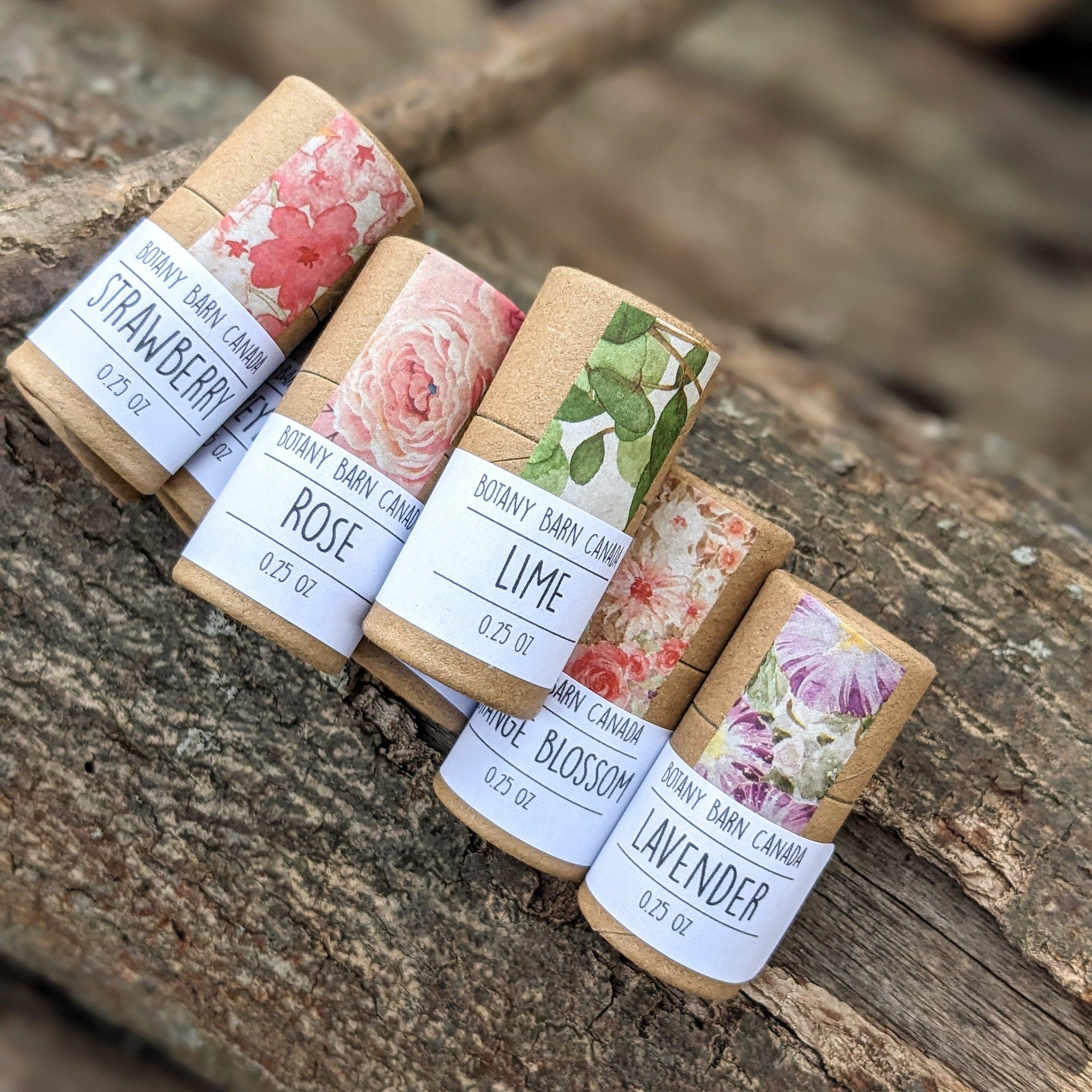 Botany Barn Canada products, various floral patterned paper wrap, brown cardboard tubes, white labels with text