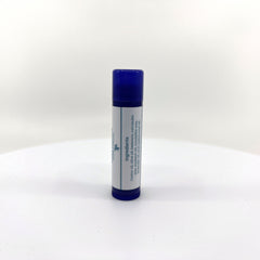 Lip balm tube with blue cap, white label, and visible ingredients list
