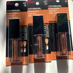 Three CoverGirl Gilty Party liquid glitter eyeshadows in gold, silver, and bronze with doe-foot applicators