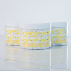 Body butter jars, clear plastic, white lids, yellow label with Soogs Body Care text