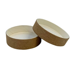 Round cardboard box with brown exterior, white interior, and simple design