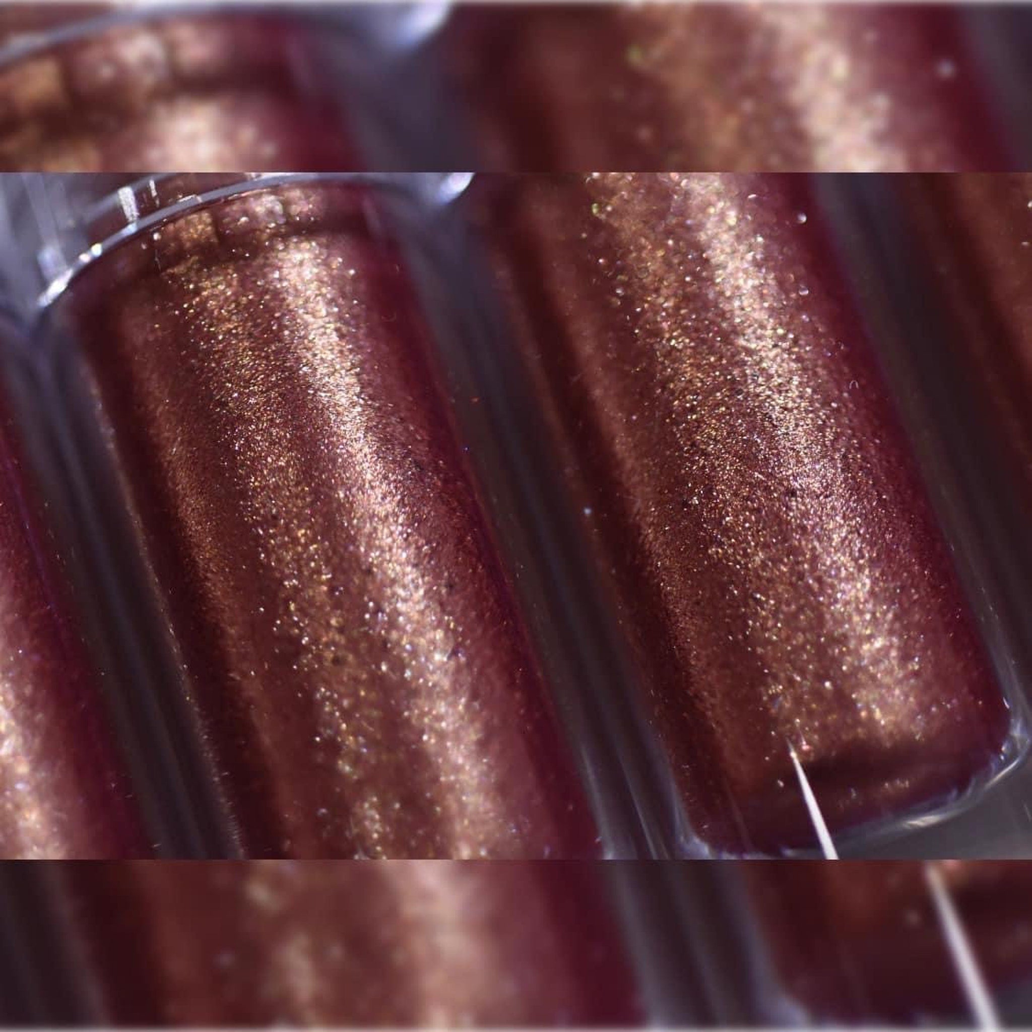 Side view of Molten Shadow Diamond Luxe eyeshadow pot showing metallic finish and faceted packaging details