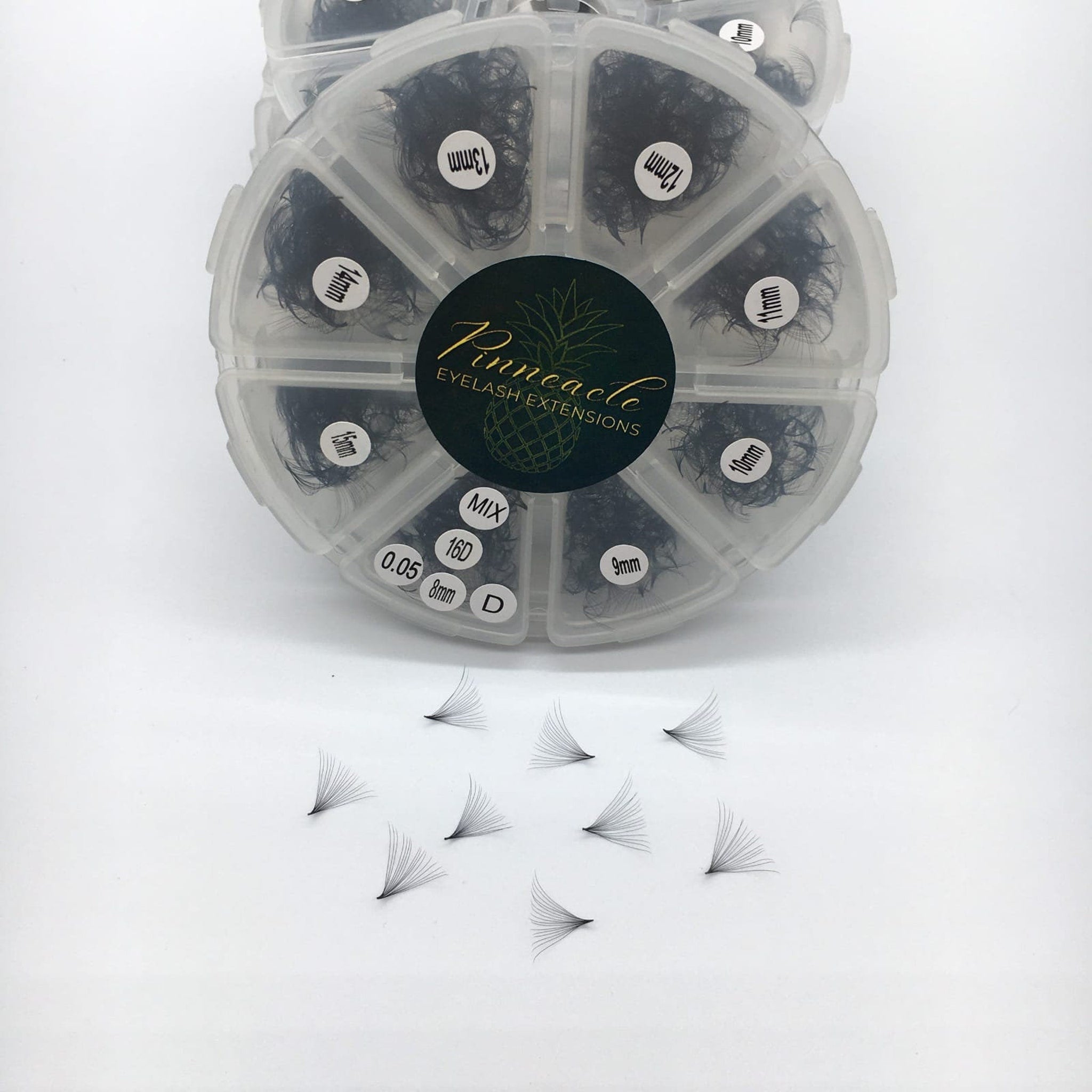 Eyelash extensions in black, with clear plastic container and Pinneacle brand label visible