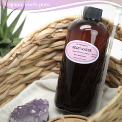 Rose water bottle, brown glass bottle with black cap, in woven basket with Dr Adorable label