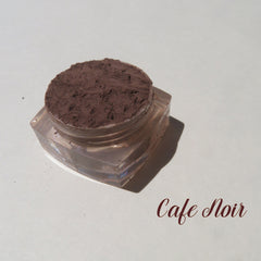 Matte dark brown mineral eyeshadow in loose powder form with vegan Cafe Noir pigment, cruelty-free, shown in open jar