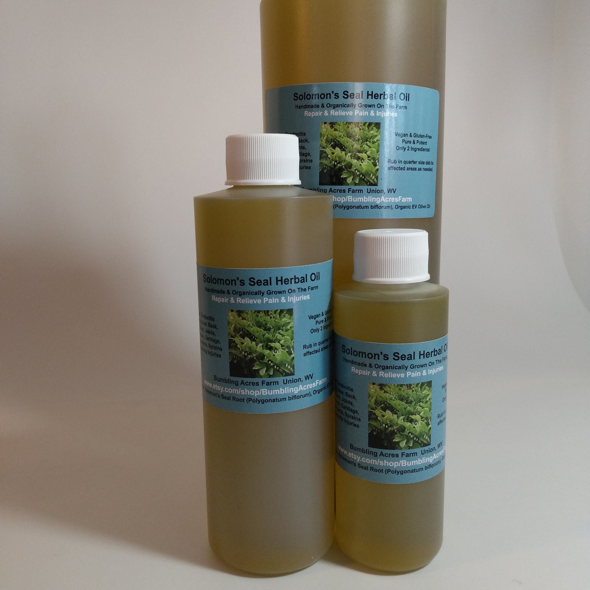 Herbal oil bottles with white caps, clear liquid, and blue labels with "Solomon's Seal" text.
