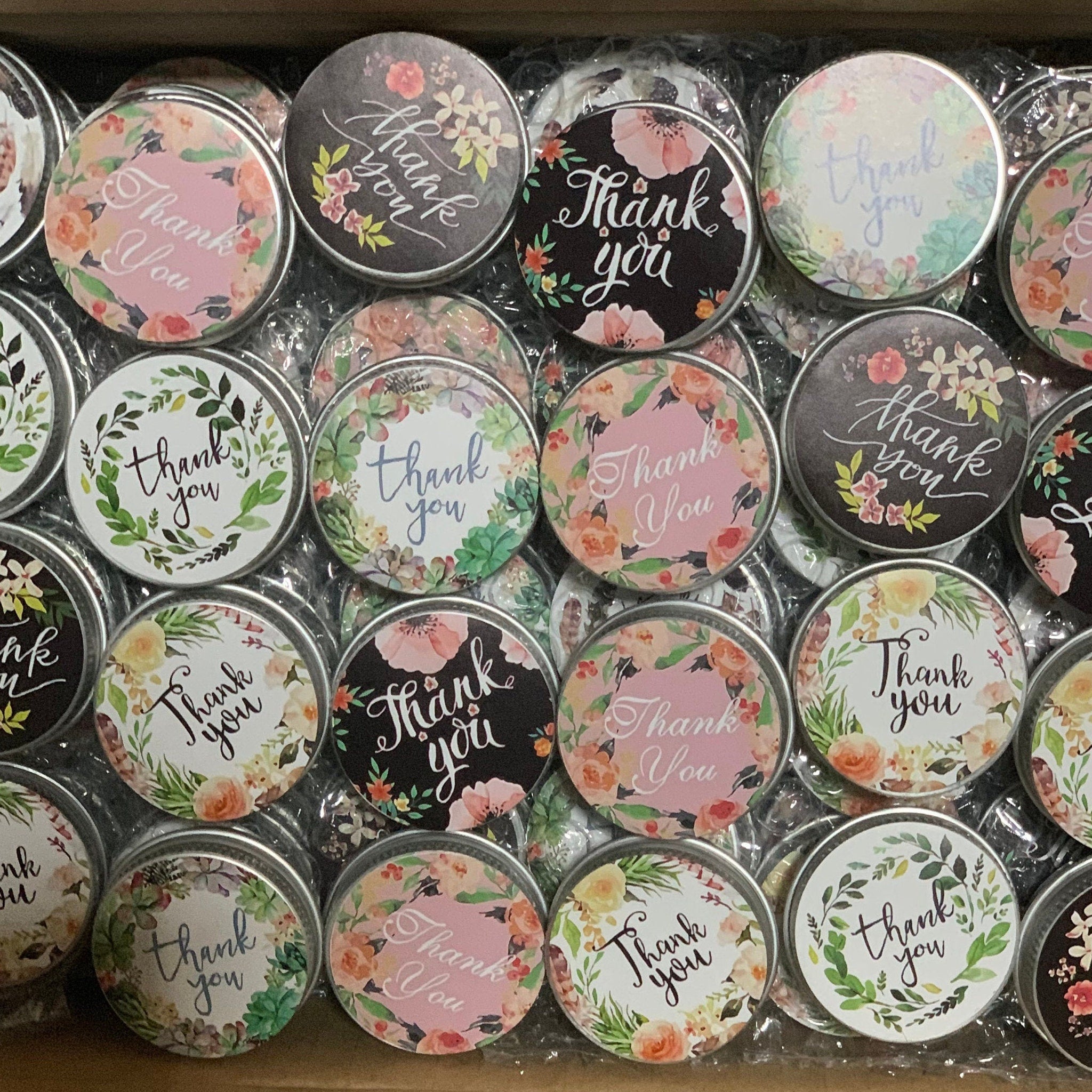 Round stickers with floral designs and "Thank You" text in various colors and styles