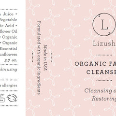 Organic facial cleanser label with light pink background, white floral pattern, and Lizush text