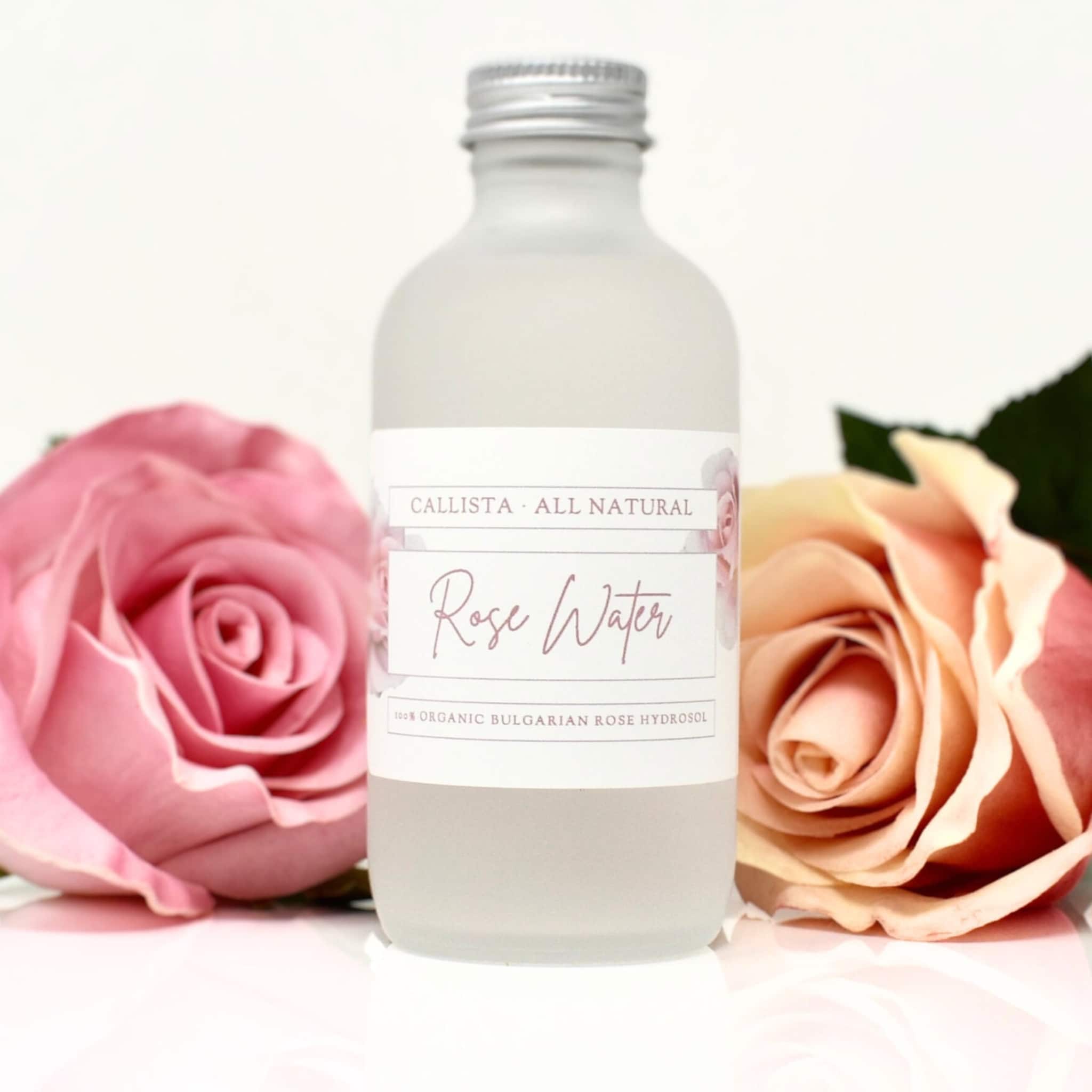 Rose water toner bottle, frosted glass, silver cap, Callista Naturals label, with pink roses