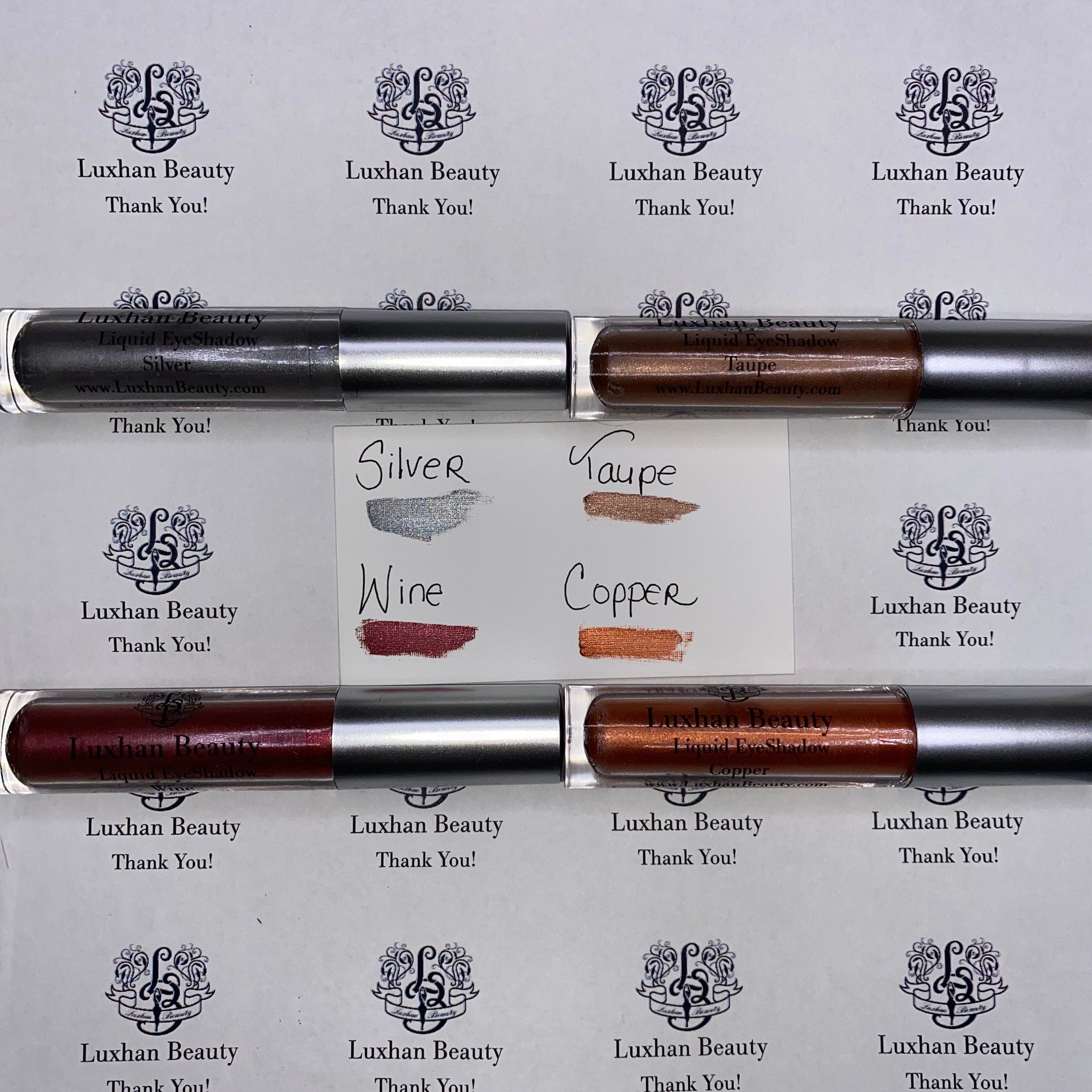 Liquid eyeshadow tubes with silver cap, various colors, Luxhan Beauty brand