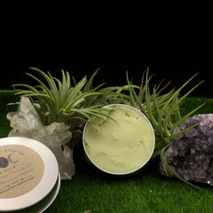 Pain relief cream in a silver tin, with green cream, and text "Natural Pain Relief Cream