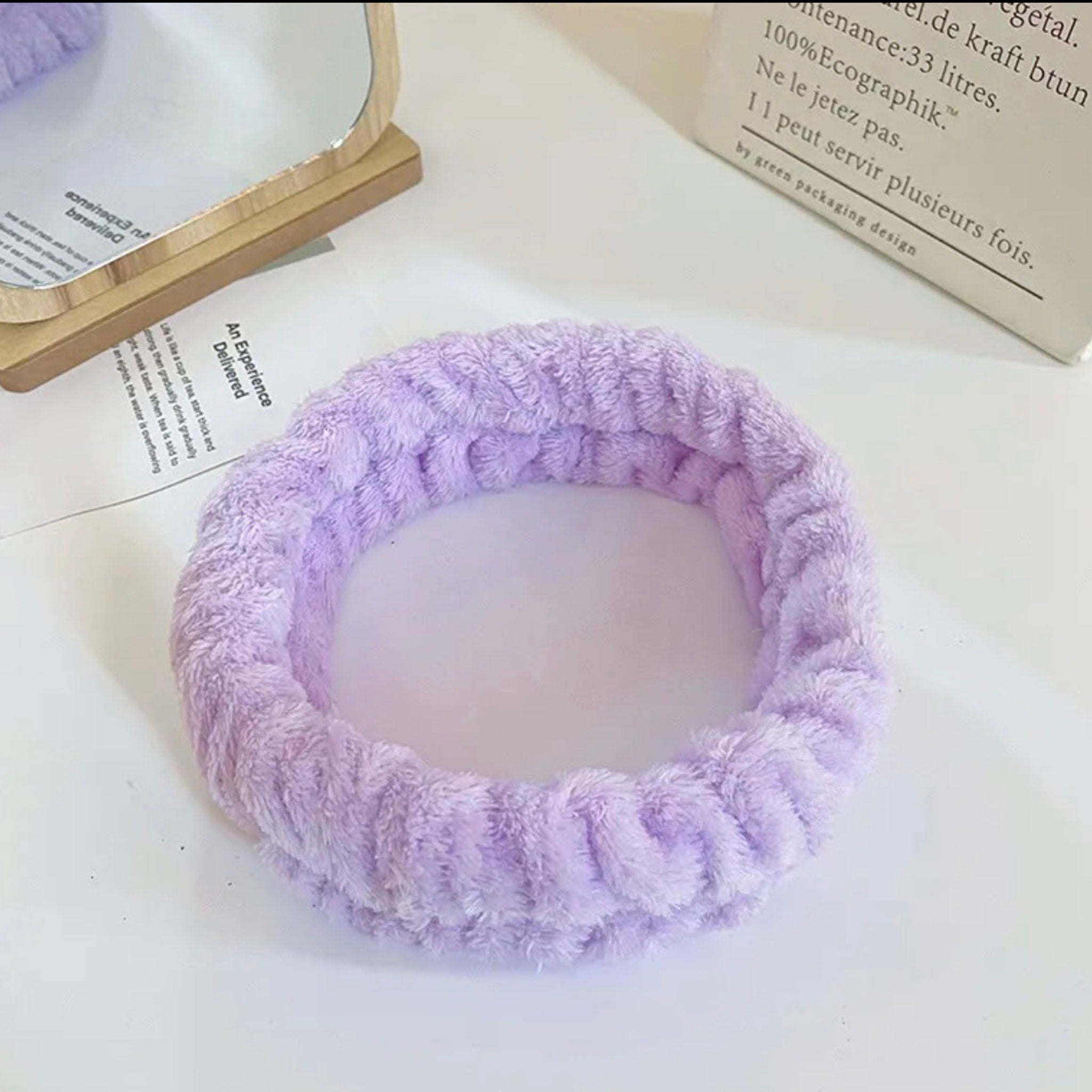 Headband, lavender plush material, circular shape