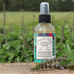 Toner bottle with black cap, clear liquid, and Mountain Valley Botanics label