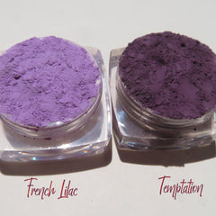 Side view of matte purple mineral eyeshadow set showing loose powder texture in vegan-friendly packaging