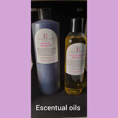 Burning oils in blue and yellow bottles with black caps, E-Scentual Natural Products brand