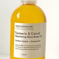 Close-up of golden turmeric-infused body oil with carrot extract in an amber glass bottle, showcasing rich texture