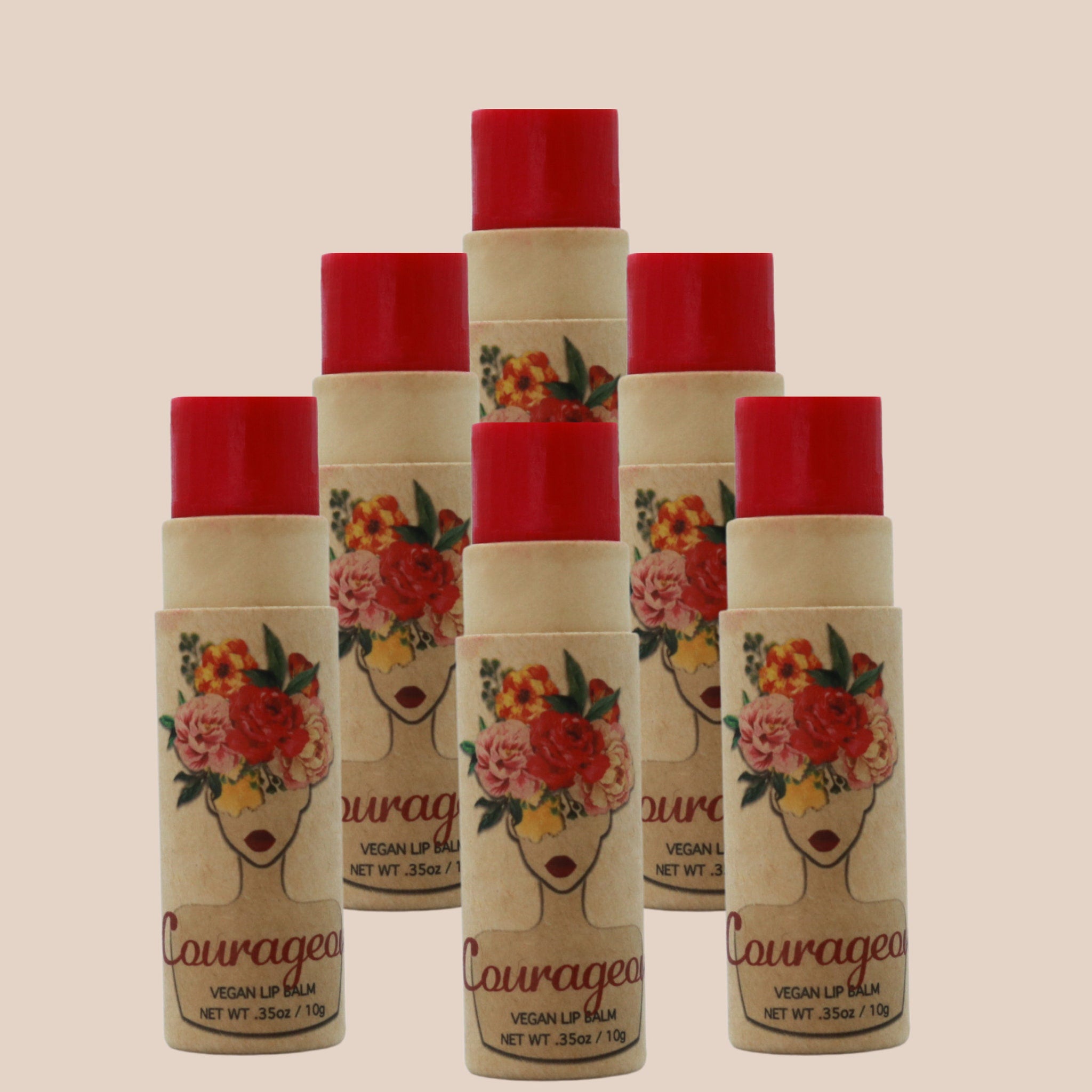 Lip balm tubes with red tops, floral print and Courageo branding visible on the packaging