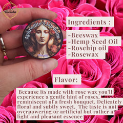 Lip balm tin with floral artwork, held by hand, Merakii brand name visible against rose background
