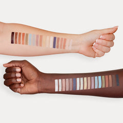 Close-up of vegan mineral eyeshadow pan showing soft matte texture in natural earth tones for sensitive eyes