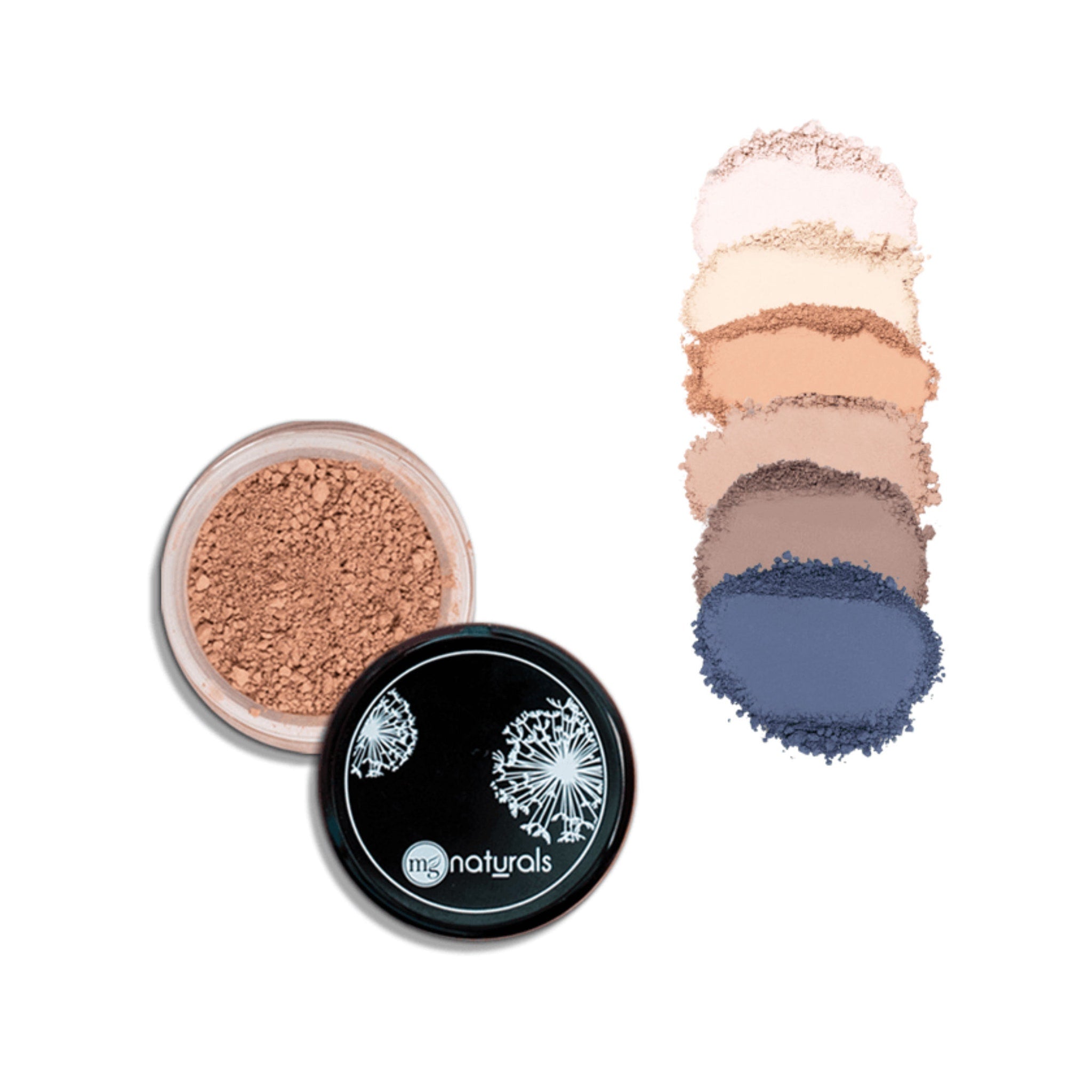 Hand applying vegan mineral eyeshadow with a soft brush, showcasing smooth blendable texture on eyelid