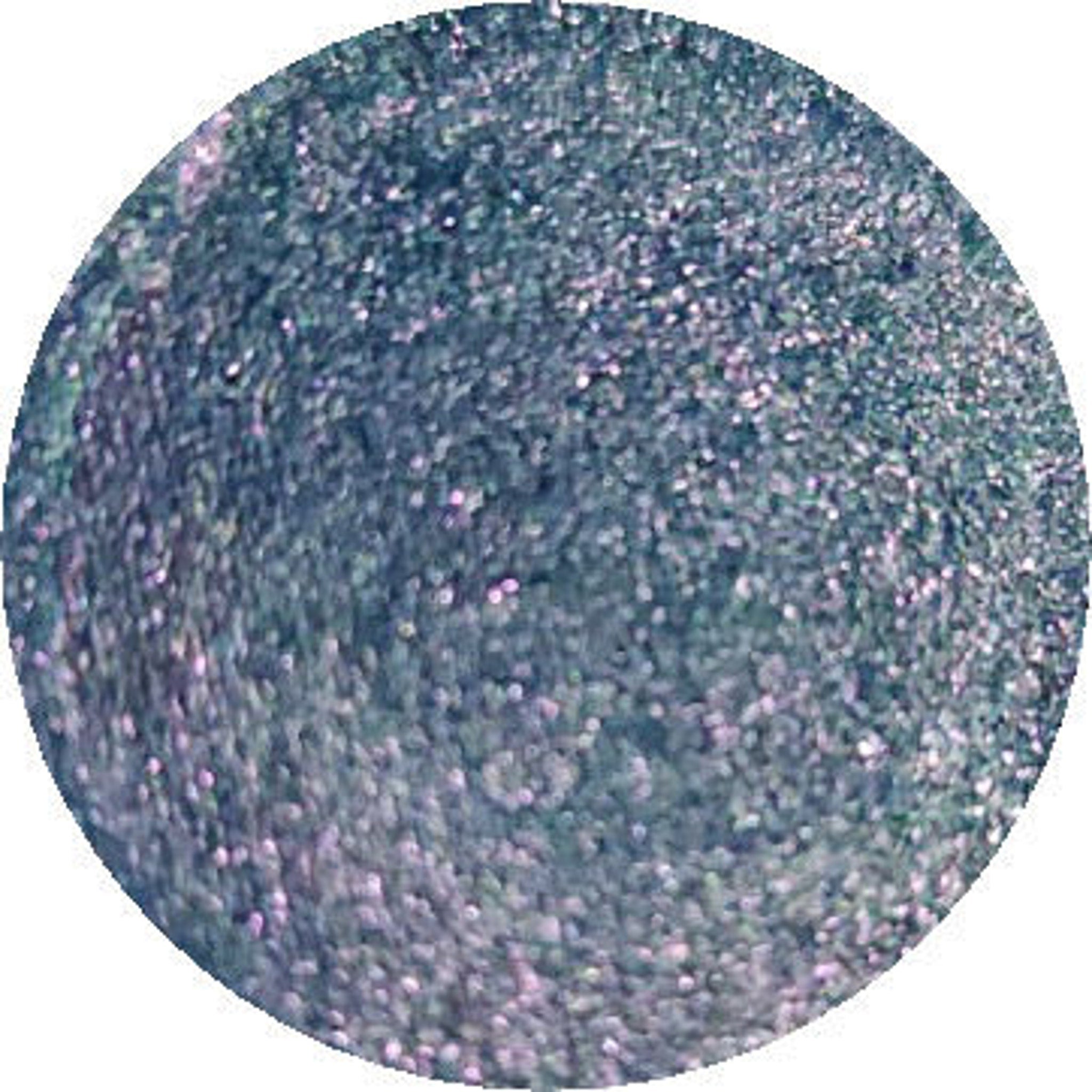 Close-up of shimmering bronze and taupe eye shadow pans in sleek black compact