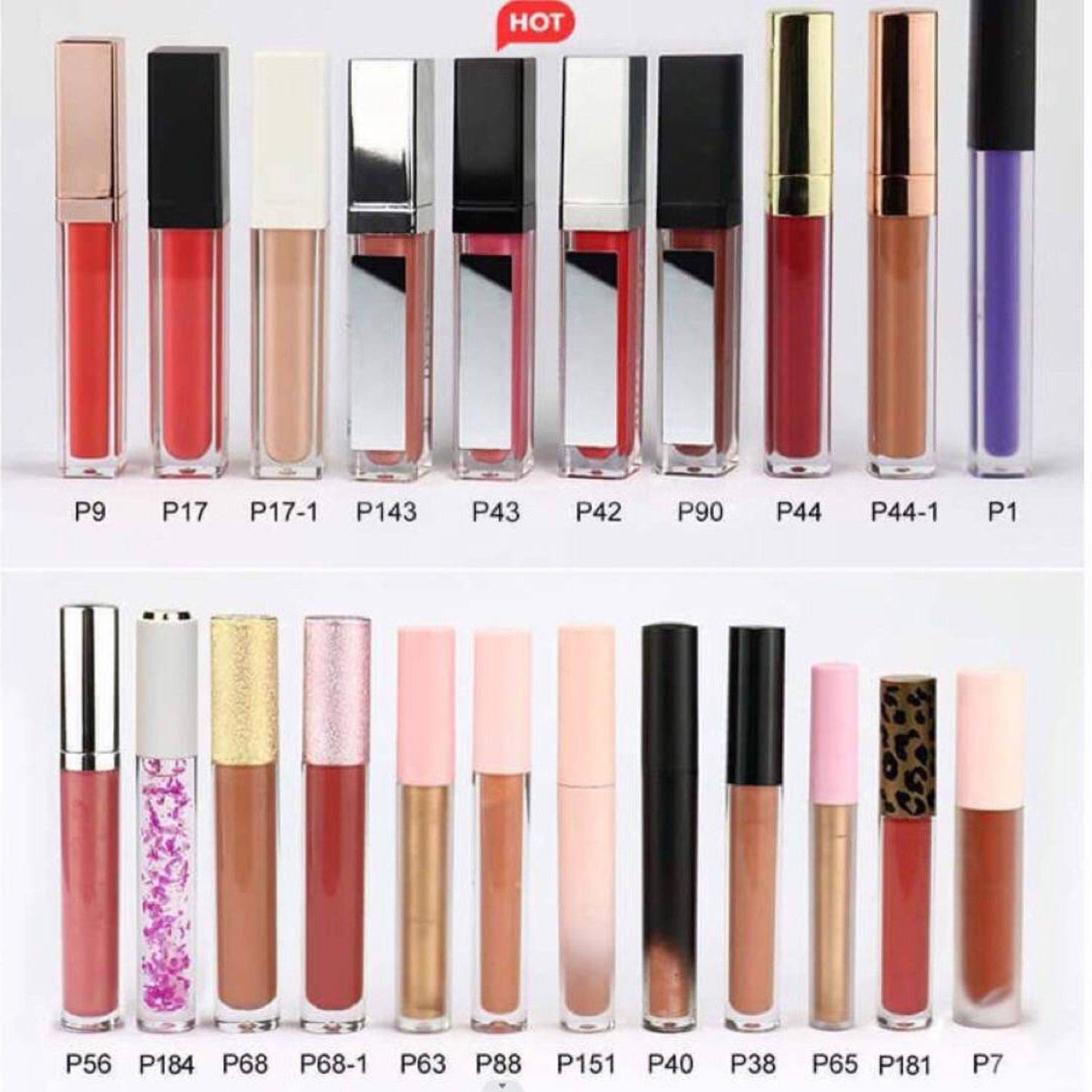 Lip gloss tubes in various colors, with black, gold, silver, and pink caps, and clear tubes