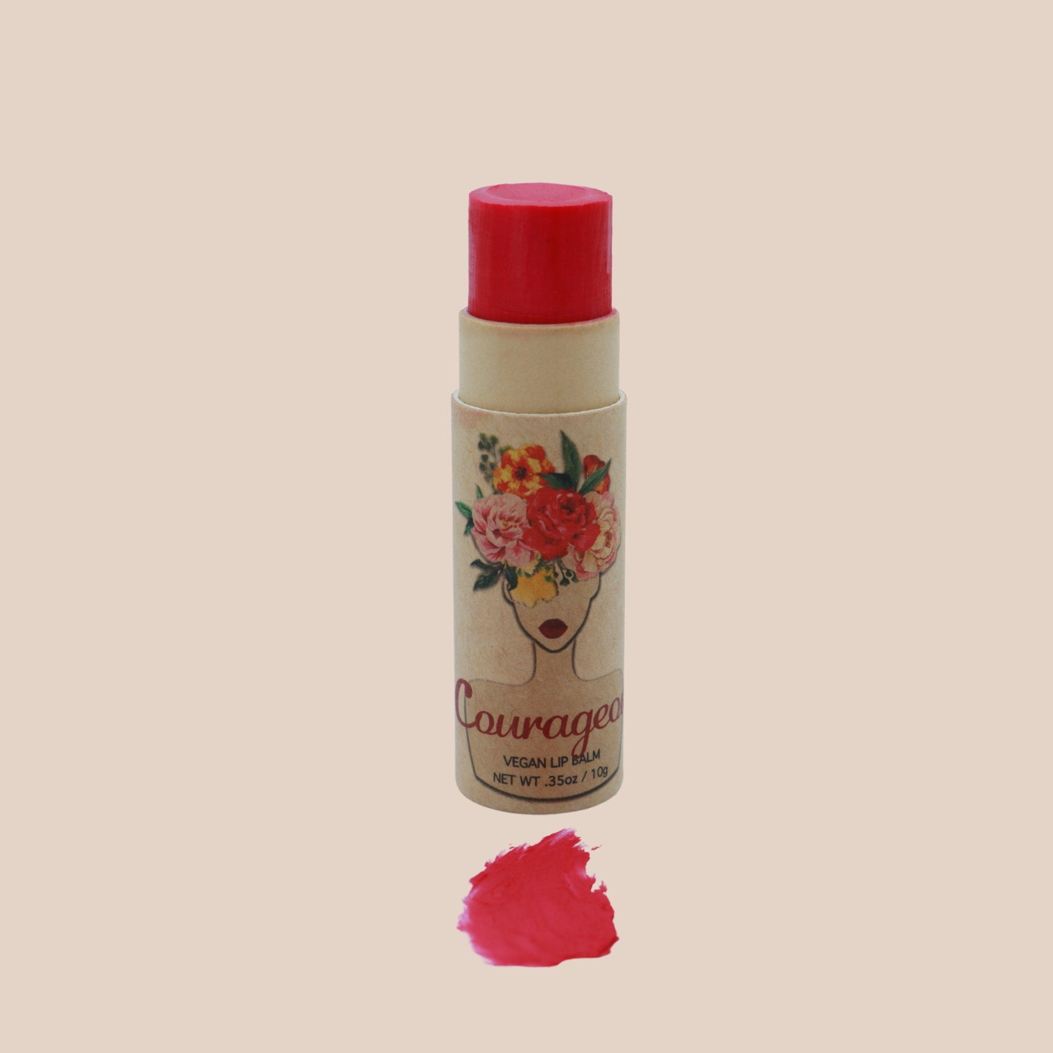 Lip balm with red color, floral illustration, and "Couragea" brand text
