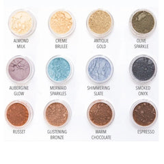 Side view of vegan mineral eyeshadow pan showing matte taupe powder texture in compact case