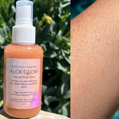 Close-up of shimmering aloe mist spraying from sleek pink bottle with gold accents
