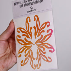 Face and body holo stickers with orange and pink floral design, Vex Beauty brand visible