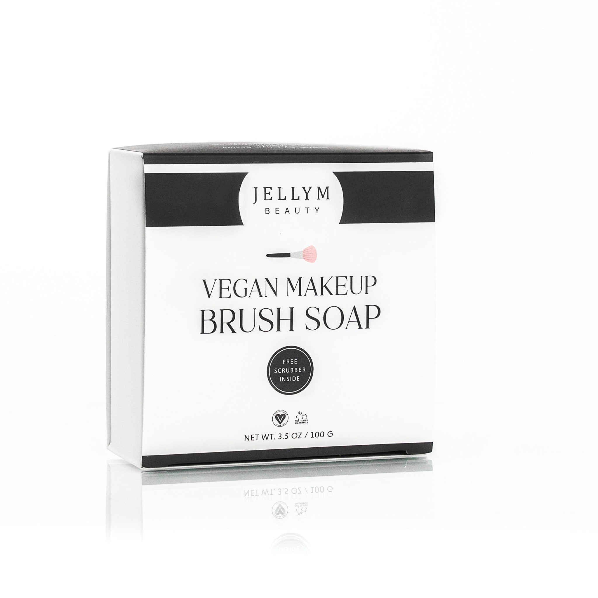 Side view of vegan brush soap bar with free scrubber on bamboo tray, showcasing natural cleaning solution for makeup tools