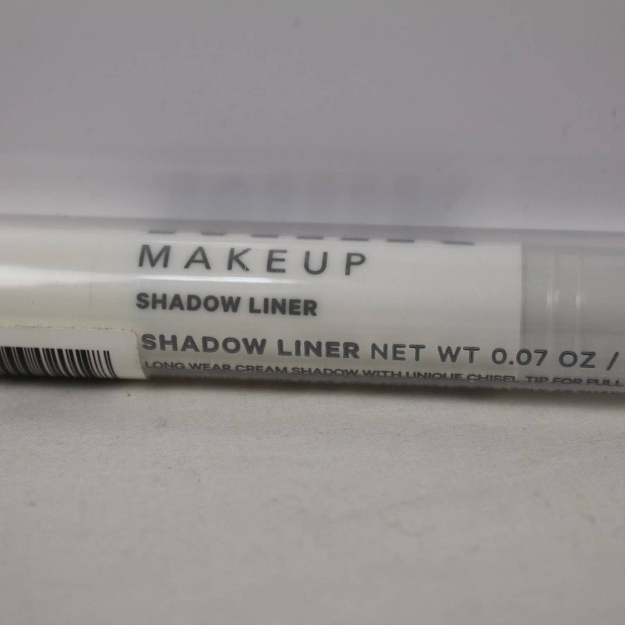 Close-up of Milk Makeup Eye Shadow pan showing creamy matte texture in neutral warm tone