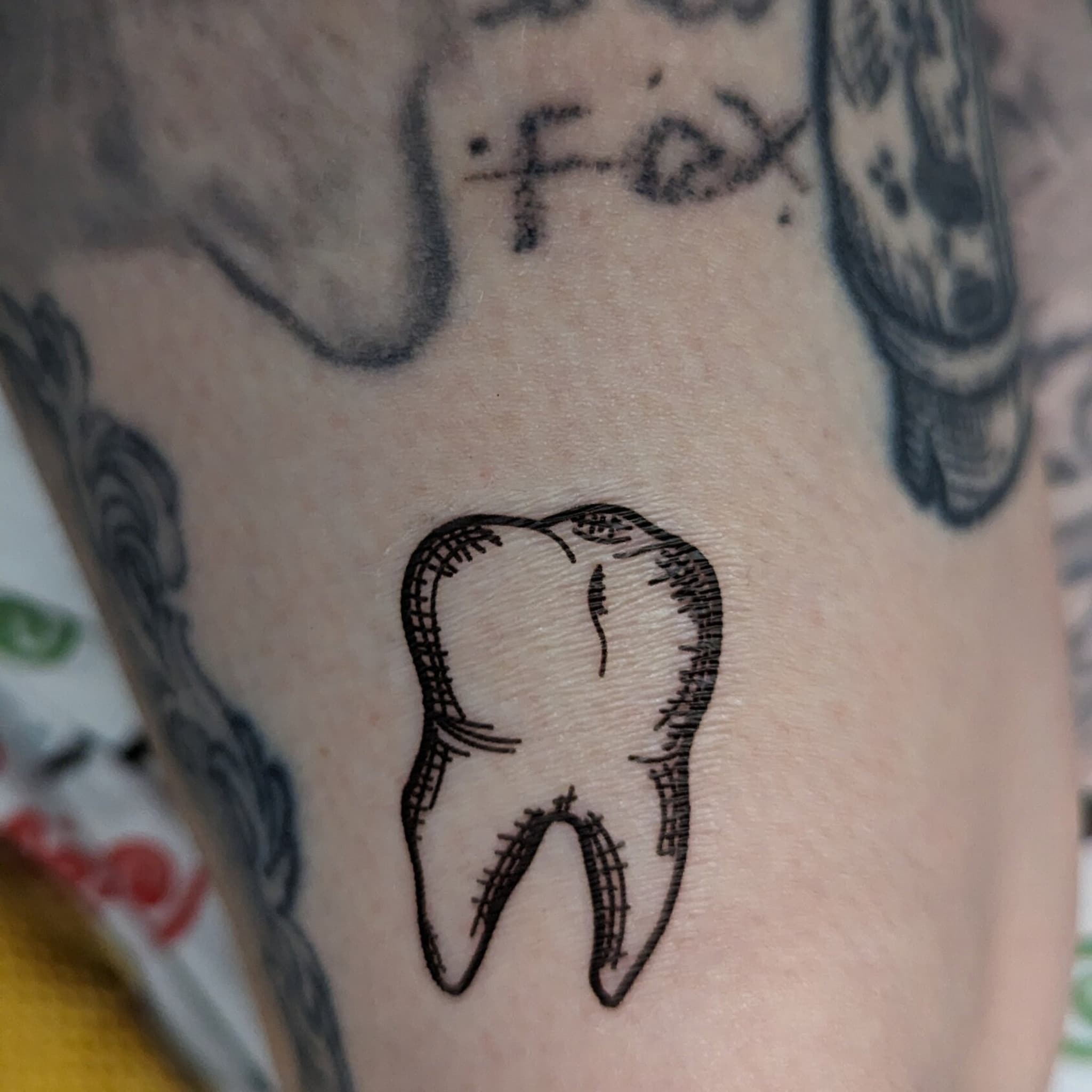 Usage example of 5cm Human Tooth Temporary Tattoo for Skin