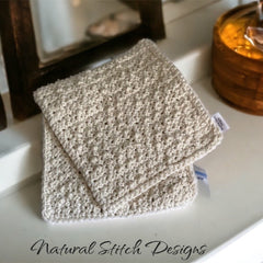 Washcloths, beige crochet washcloths, Natural Stitch Designs label visible, folded on white surface